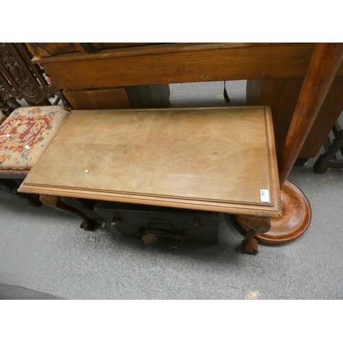 419 - Mahogany glass top coffee table on ball and claw feet.