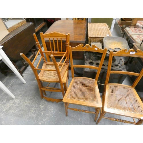 427 - Four various Edwardian cane seat dining chairs.