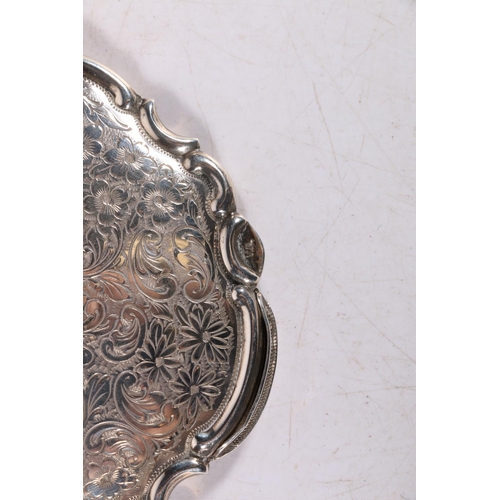 106 - Sterling silver compact with all-over incised floral and scroll design and C-scroll border, 9cm diam... 