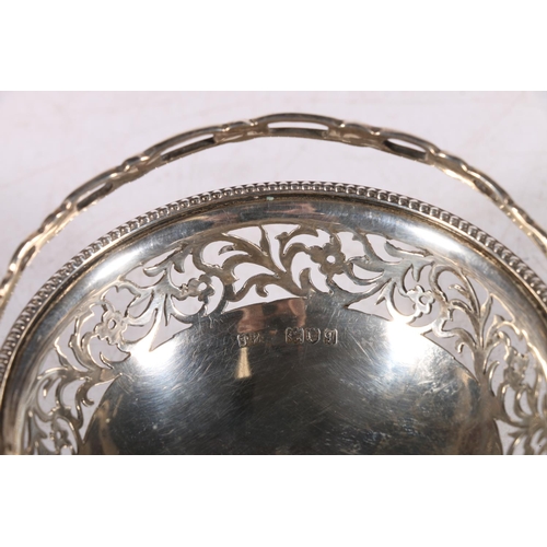 109 - Victorian silver miniature basket with pierced border and swing handle, marks rubbed, Birmingham 189... 