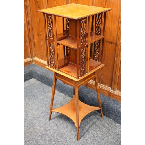 404 - Edwardian mahogany and satinwood banded revolving bookcase, raised on tiered stand with splayed squa... 