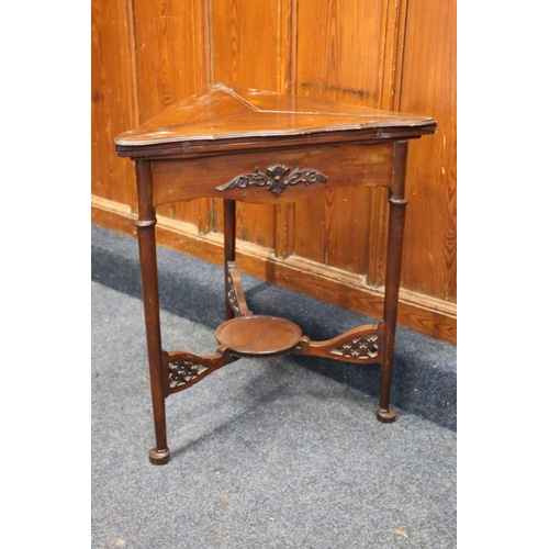 468 - Antique mahogany triangular triple flap envelope table, raised on circular supports terminating in b... 