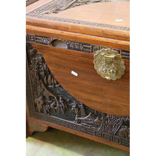 527 - Oriental carved camphorwood chest.