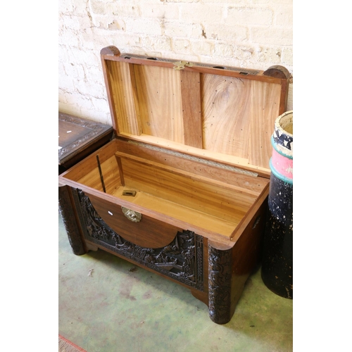 527 - Oriental carved camphorwood chest.