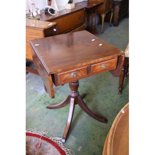 535 - Mahogany occasional table with drop-leaf ends, two drawers either side.