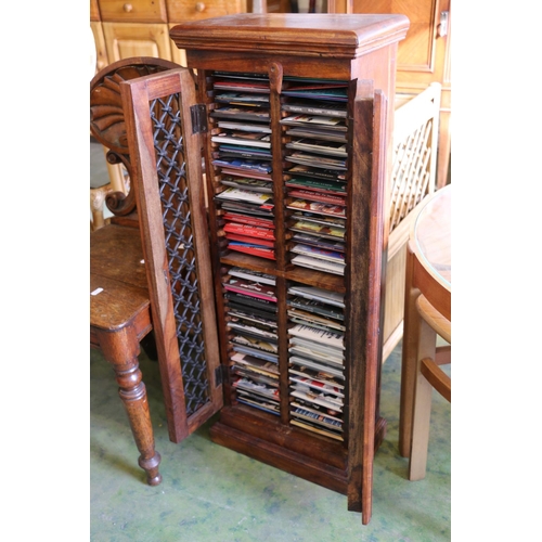 543 - CD cabinet with contents.