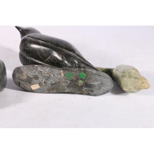 245 - Six Canadian or Inuit soapstone carvings to include a reclining seal, a squirrel, a falcon, etc.  (6... 