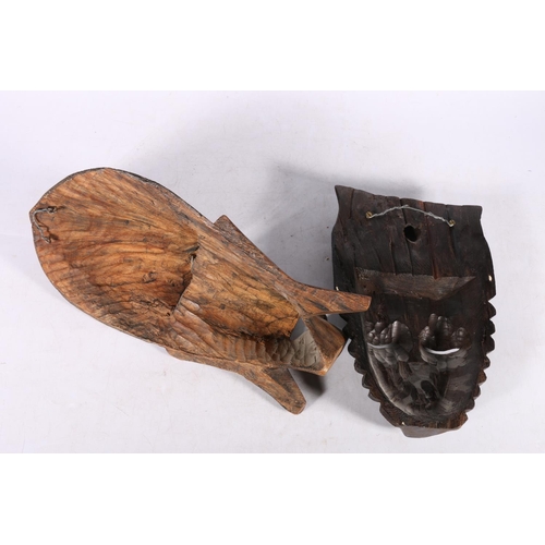 248 - Two African carved hardwood masks, 35cm and 28cm long.  (2)