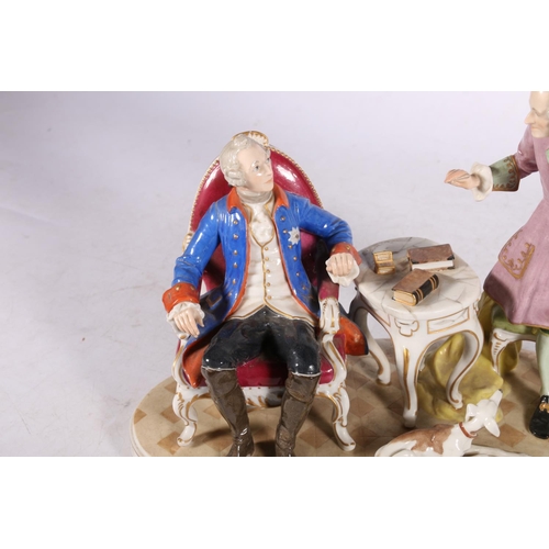 256 - French porcelain figure group of Frederick II and Voltaire modelled seated with a greyhound, 23cm hi... 