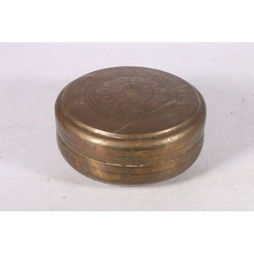 260 - Brass round box with lid, and a large Middle Eastern copper container with lid, 18cm diameter.  #62