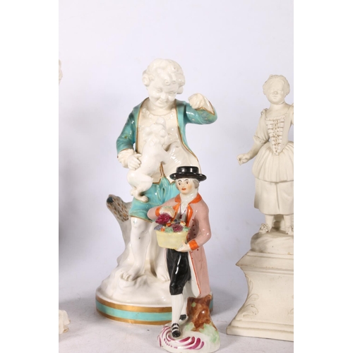 263 - Porcelain figure of a boy with a dog, 22cm high, a pair of white glazed figural candlesticks and fou... 