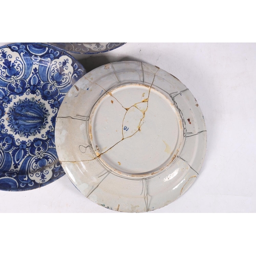 266 - Three 18th century Delft pottery plates, matching cobalt blue and white design, 31cm diameter.  (3) ... 