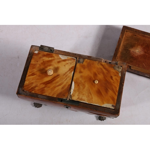 279 - 19th century tortoiseshell tea caddy of casket form, having twin division interior, raised on metal ... 