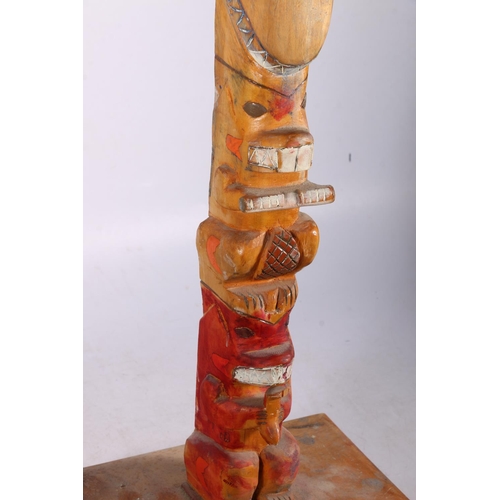 283 - Canadian carved and painted totem pole, 88cm high, signed indistinctly to base.  #428