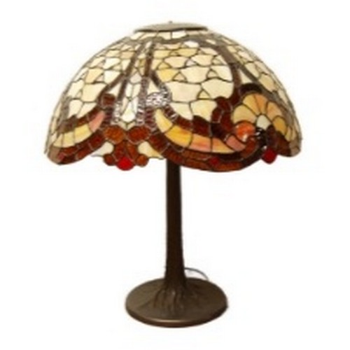 Good quality Tiffany of New York-style table lamp with large multi-coloured stained leaded shade, on bronzed column stand and circular base, pewter tag on chain to the column, overall between 60cm - 70cm high.