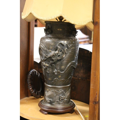 141 - Japanese bronze vase table lamp, relief dragon decoration, with yellow shade, 91cm high. #64