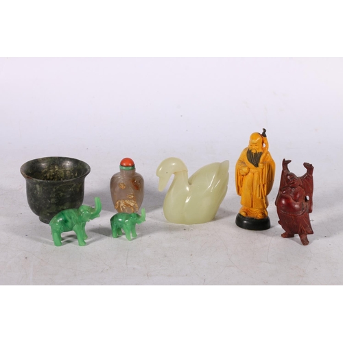 234 - Chinese spinach green jade style hardstone sake cup, 5cm high, a Peking glass swan, two miniature el... 