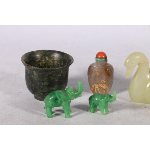 234 - Chinese spinach green jade style hardstone sake cup, 5cm high, a Peking glass swan, two miniature el... 