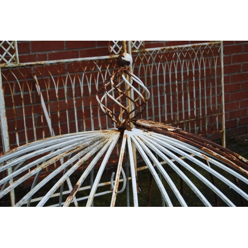 303A - Victorian-style eight-section metal gazebo, approximately 300cm high and approximately 220cm wide.