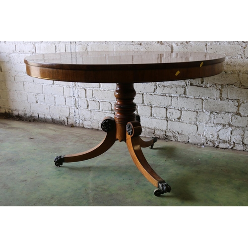 392 - Early 19th century rosewood tilt-top breakfast table, the circular snap top with brass inlay, raised... 