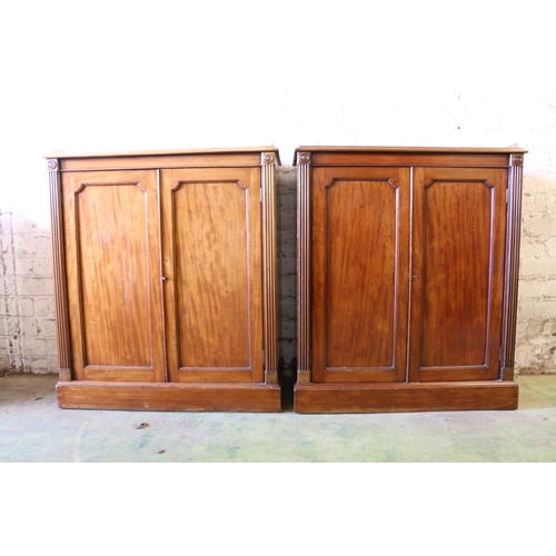 393 - Pair of 19th century Regency style mahogany side cabinets, the rectangular tops with pierced brass t... 