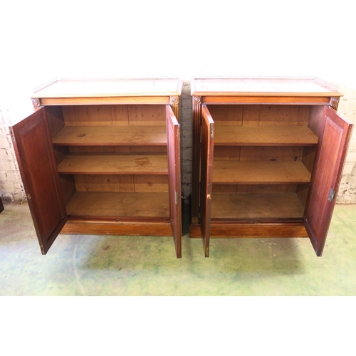 393 - Pair of 19th century Regency style mahogany side cabinets, the rectangular tops with pierced brass t... 