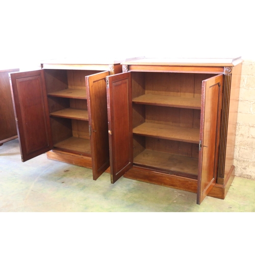 393 - Pair of 19th century Regency style mahogany side cabinets, the rectangular tops with pierced brass t... 