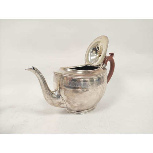 22 - Silver three piece teaset of Georgian style, boat shaped with pin struck band by the Goldsmiths &... 