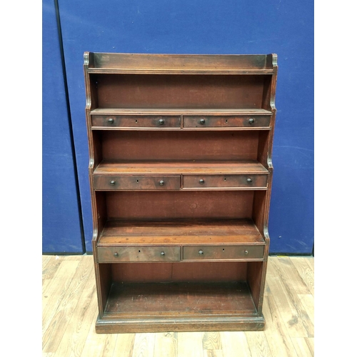 370 - 19th Century mahogany waterfall bookcase with open shelving interspersed with three pairs of small d... 