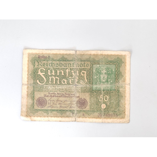 193 - Germany. 1910s/20s banknotes to include ten 1914 20 Mark notes, a 50 Mark note dated 1919 serial no ... 