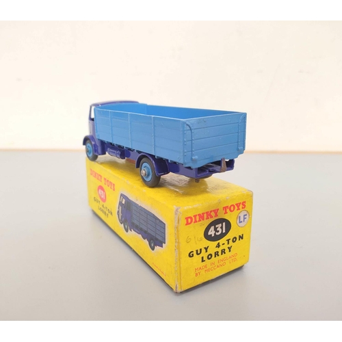 12 - Dinky Toys. Two boxed Guy Warrior 4-Ton Lorries No 431 one with light tan cab and dark green back, t... 