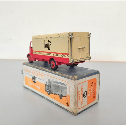 14 - Dinky Toys. Guy Van 'Spratts'  No 514 red cab and lower body and cream upper van body with comp... 