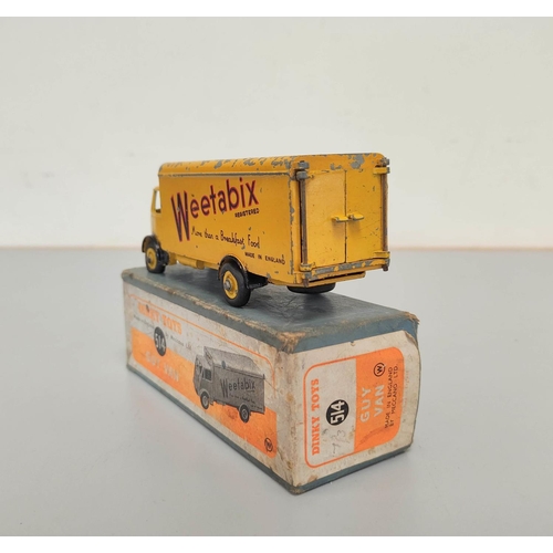 15 - Dinky Toys. Guy Van 'Weetabix'  No 514 yellow cab and body with applied company logo to the sid... 