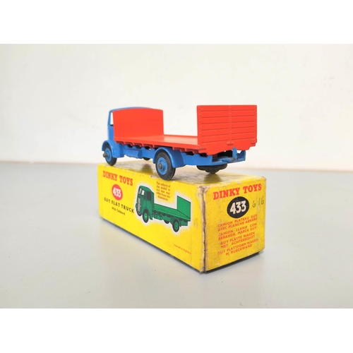 17 - Dinky Toys. Boxed diecast Guy Flat Truck no 433 with light blue cab & orange bed. Also another l... 