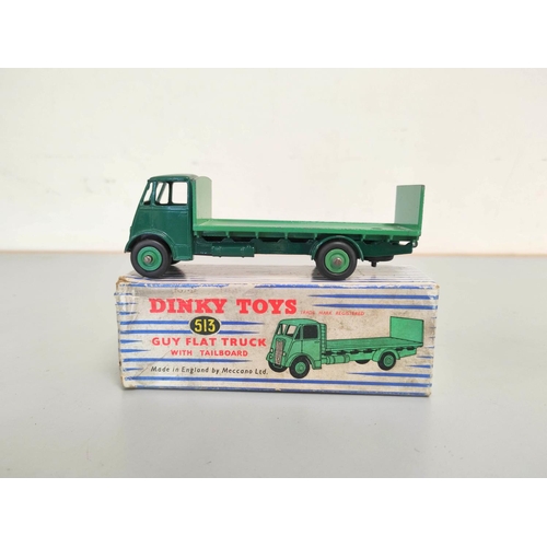 18 - Dinky Toys. Boxed diecast Guy Flat Truck with Tailboard no 513 with dark green cab & light green... 