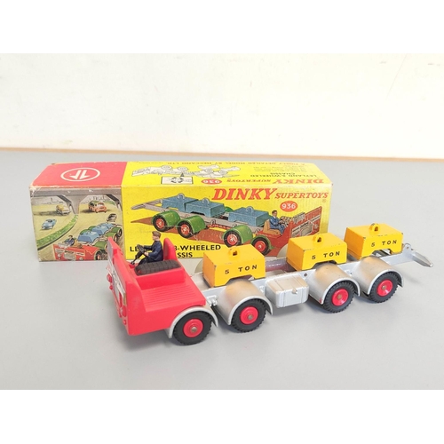 7 - Dinky Toys. Boxed Leyland 8-wheeled Chassis No 936. Comprising, silver chassis, red front with red p... 
