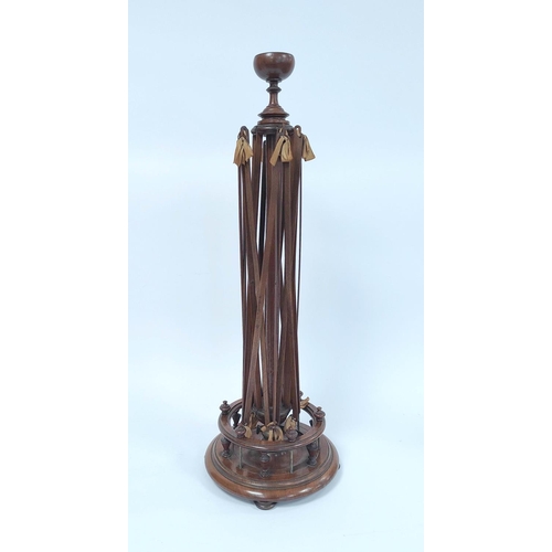 178 - Antique mahogany wool winder with extending sticks above galleried undertier raised on balustrade co... 