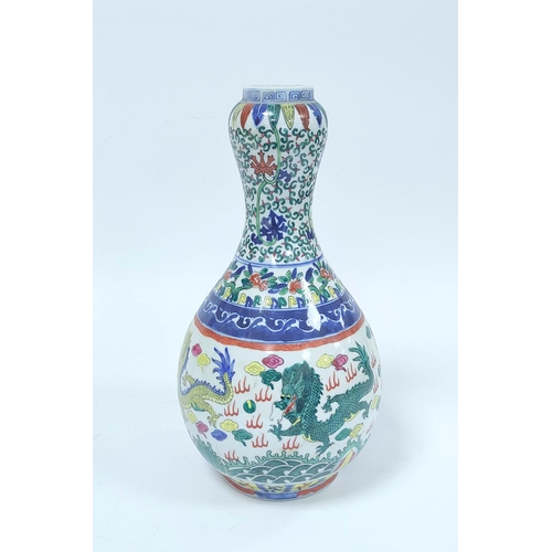 351 - Chinese Wanli style vase painted in the Doucai palette with garlic mouth, Decorated with artisan lea... 