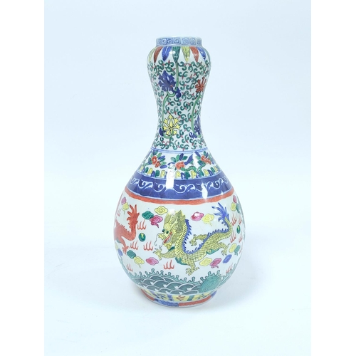 351 - Chinese Wanli style vase painted in the Doucai palette with garlic mouth, Decorated with artisan lea... 