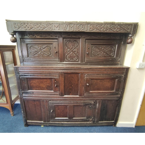 374 - Antique oak court cupboard inscribed to the frieze with initials and dated 1691, above foliate carvi... 