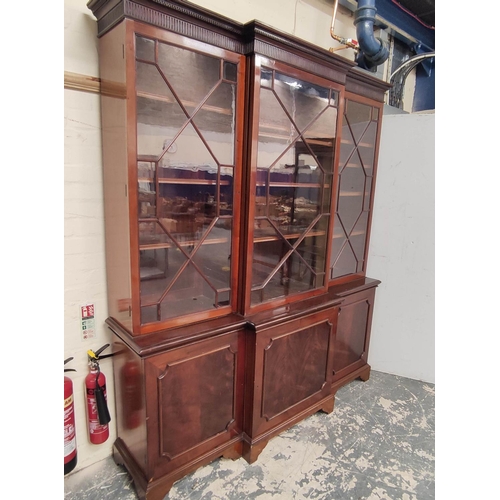 378 - Attractive Georgian style mahogany breakfront library bookcase with dentil cornice and reeded pedime... 