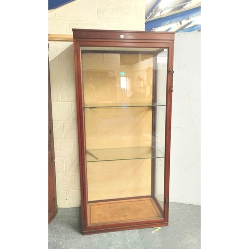 379 - Vintage mahogany glazed shop cabinet with glazed door and panels enclosing metal brackets and glass ... 