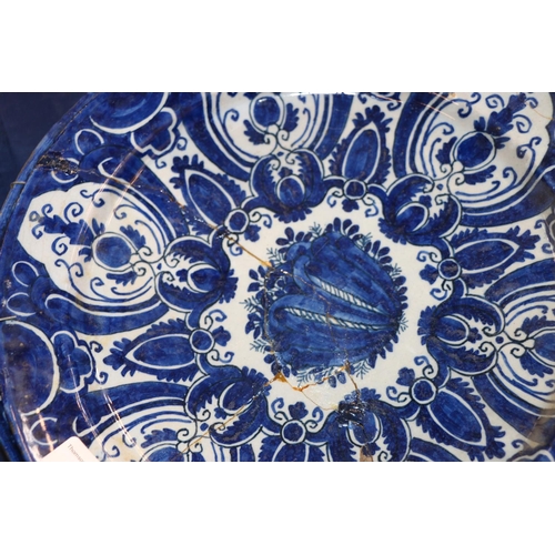 266 - Three 18th century Delft pottery plates, matching cobalt blue and white design, 31cm diameter.  (3) ... 