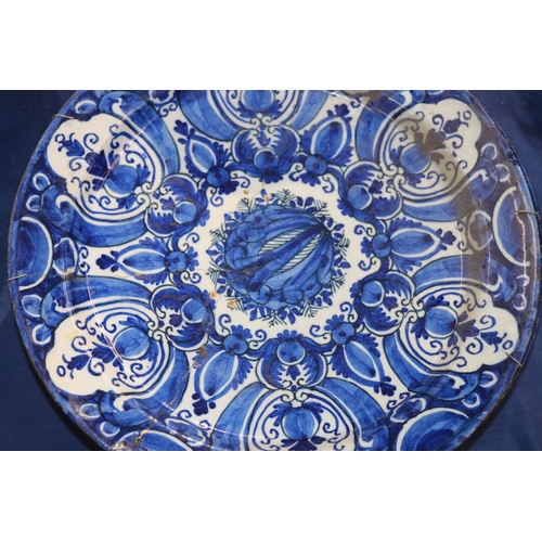 266 - Three 18th century Delft pottery plates, matching cobalt blue and white design, 31cm diameter.  (3) ... 