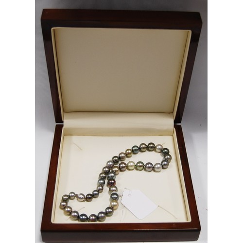 47 - Black and tinted pearl necklet on diamond-set gold ball snap, '750', by JKa Koehle.