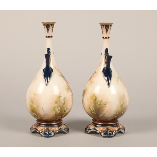 1 - Hadley's Worcester pair of twin handled vases each 24cm high