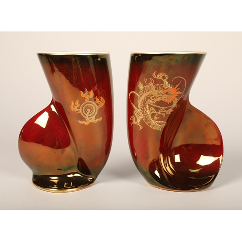 131 - Rouge Royale Carlton Ware tazza and footed bowl; two Crown Devon vases with dragon design (4).