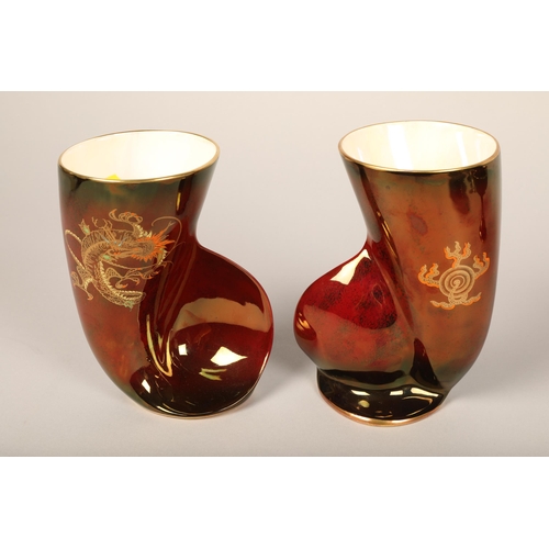 131 - Rouge Royale Carlton Ware tazza and footed bowl; two Crown Devon vases with dragon design (4).