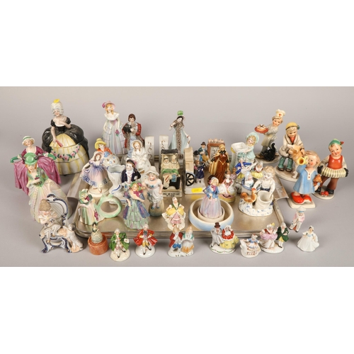 145 - Large quantity of small figurines including Hummel and other German, continental, etc