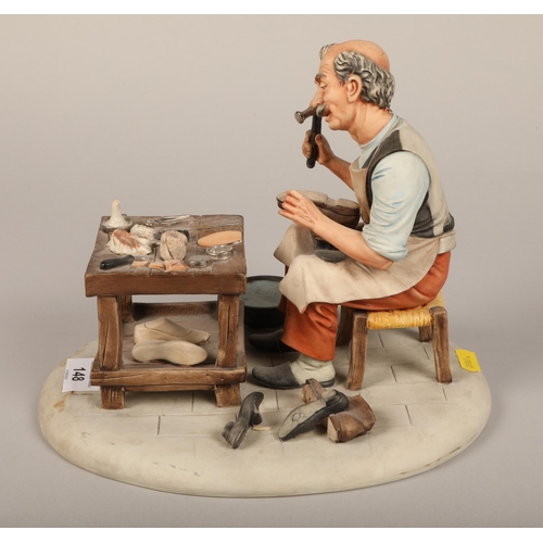 148 - Capodimonte figure of a cobbler, 21cm high